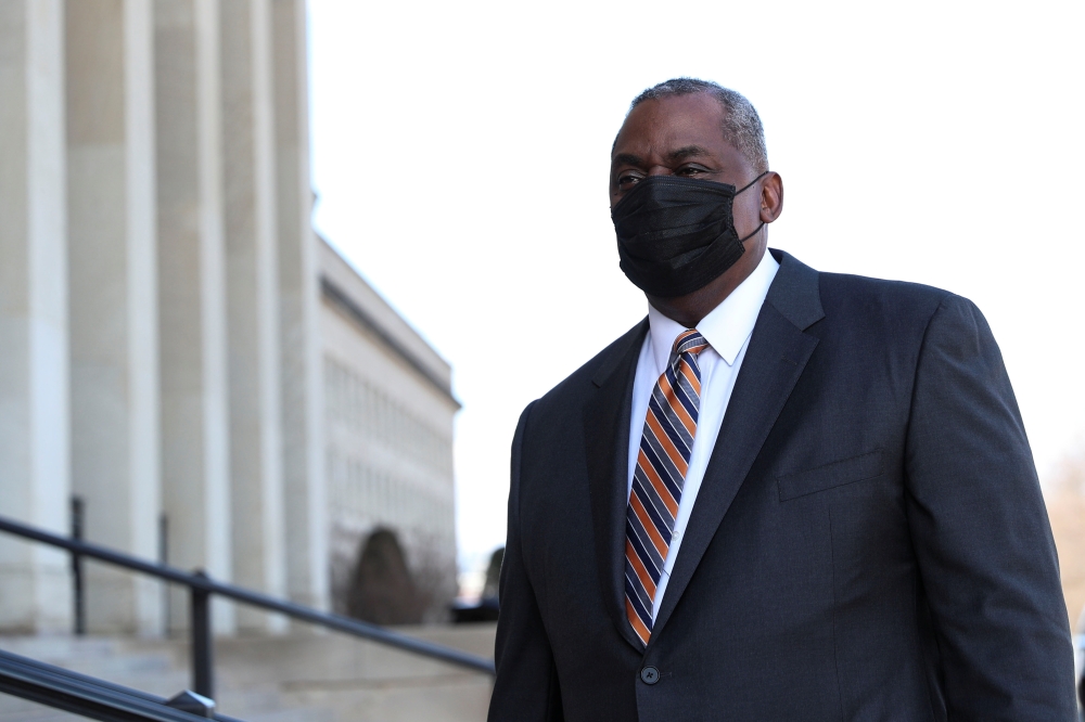 Newly confirmed US Defense Secretary Lloyd Austin arrives to begin his first day in office at the Pentagon in Arlington, Virginia, U.S., January 22, 2021. Reuters/Tom Brenner