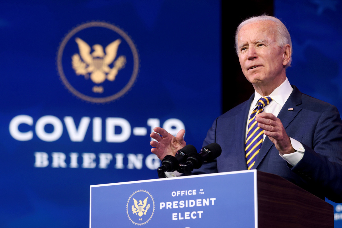 FILE PHOTO: U.S. President-elect Joe Biden delivers remarks on the U.S. response to the coronavirus disease (COVID-19) outbreak, at his transition headquarters in Wilmington, Delaware, U.S., December 29, 2020. REUTERS/Jonathan Ernst/File Photo
