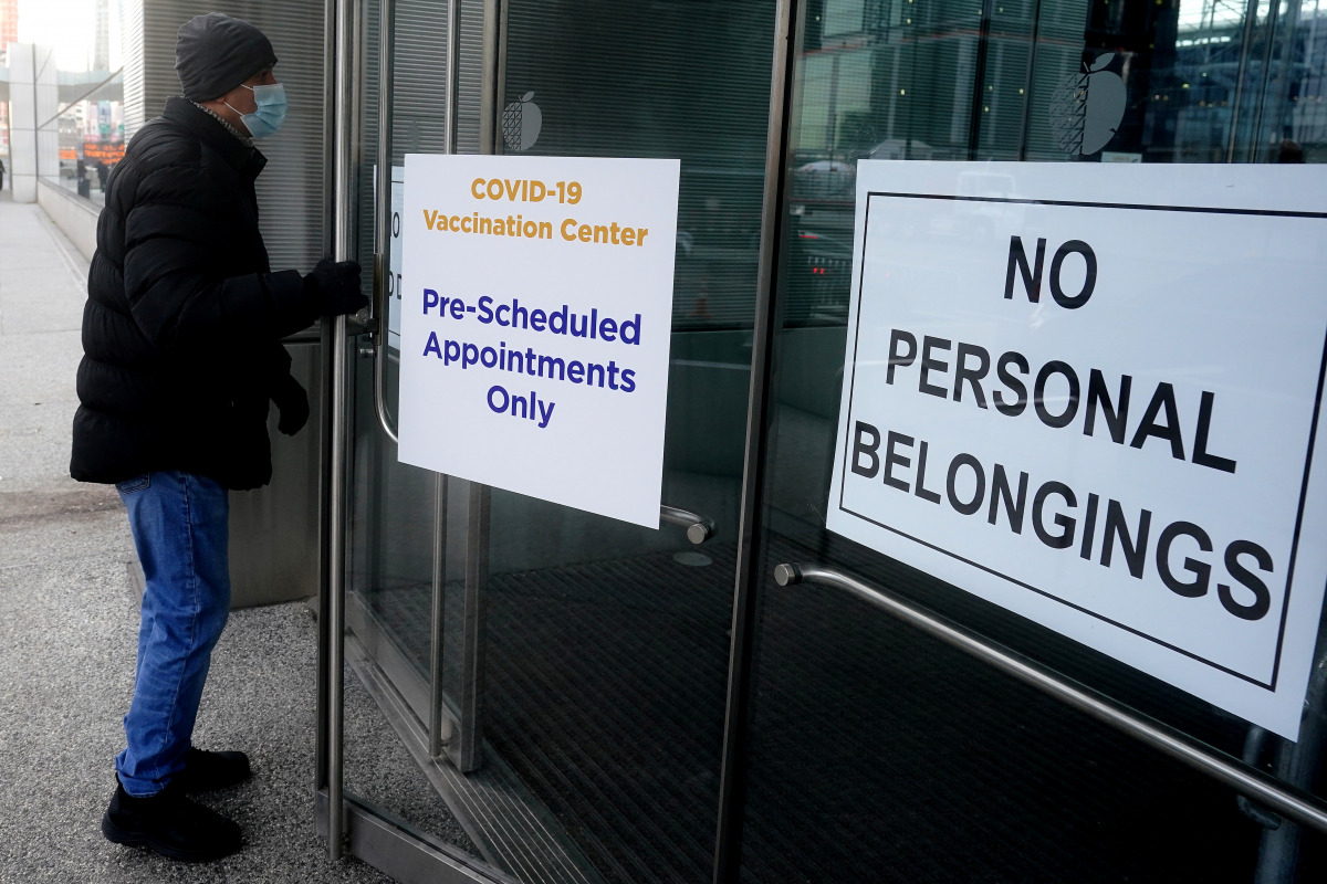 A man arrives at the Javits Center to get a vaccine in the Manhattan borough of New York City, New York, U.S., January 25, 2021. REUTERS/Carlo Allegri
