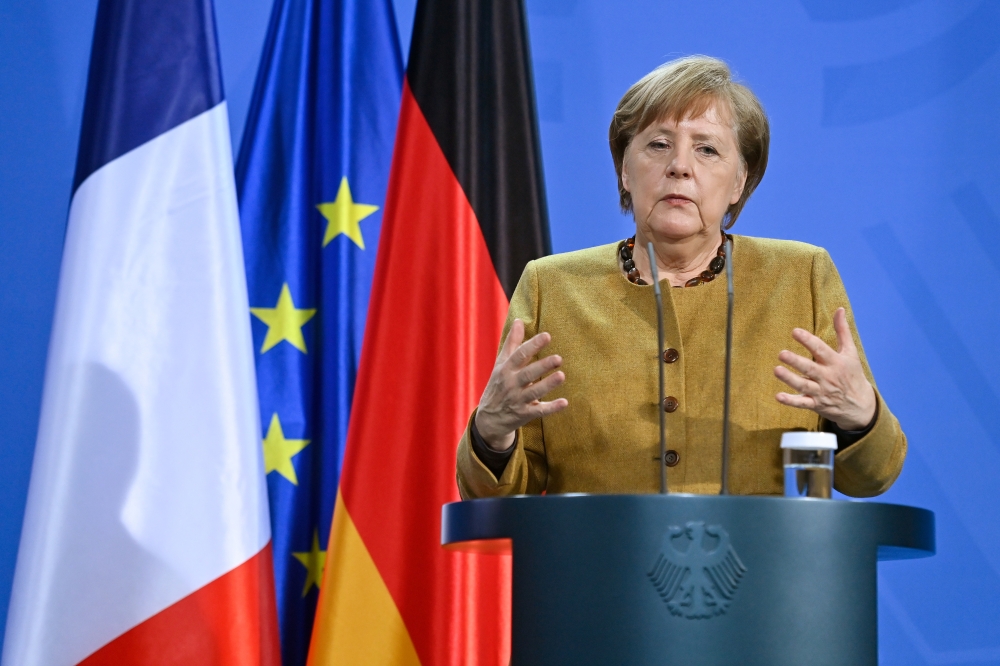 German Chancellor Angela Merkel gives a press conference with French President Emmanuel Macron (not pictured) after German-French Security Council video talks, in Berlin, Germany February 5, 2021. John Macdougall/Pool via REUTERS