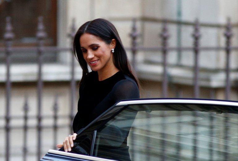 FILE PHOTO: Meghan, the Duchess of Sussex arrives at the opening of Oceania at the Royal Academy of Arts in London, September 25, 2018. Reuters / Henry Nicholls
