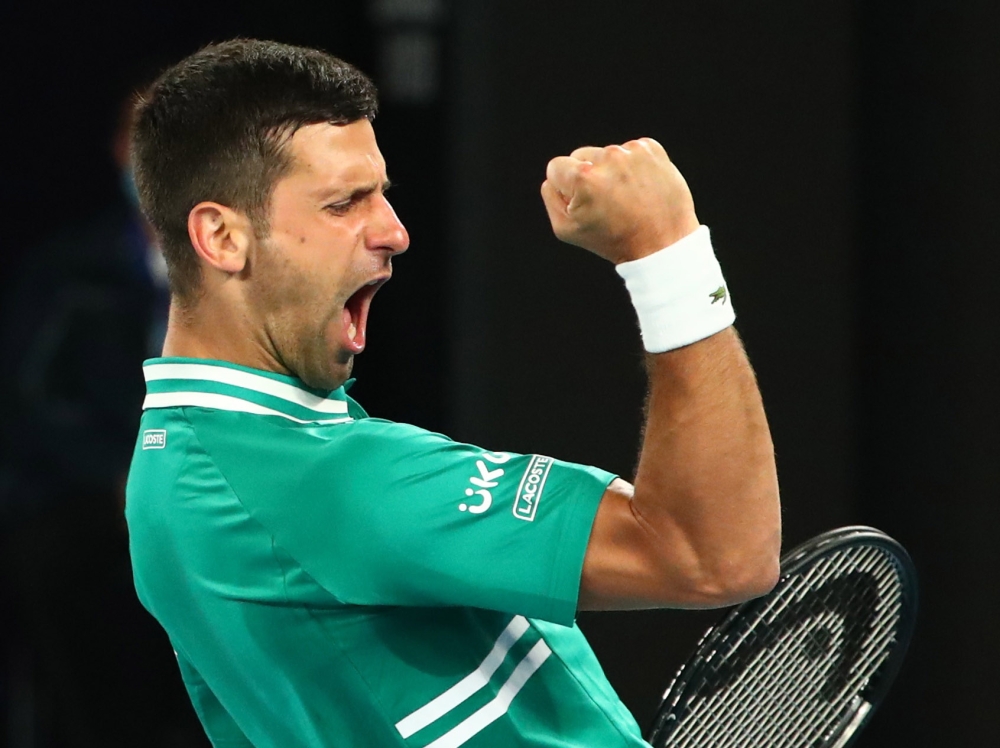 February 12, 2021 Serbia's Novak Djokovic reacts during his third round match against Taylor Fritz of the U.S. REUTERS/Kelly Defina