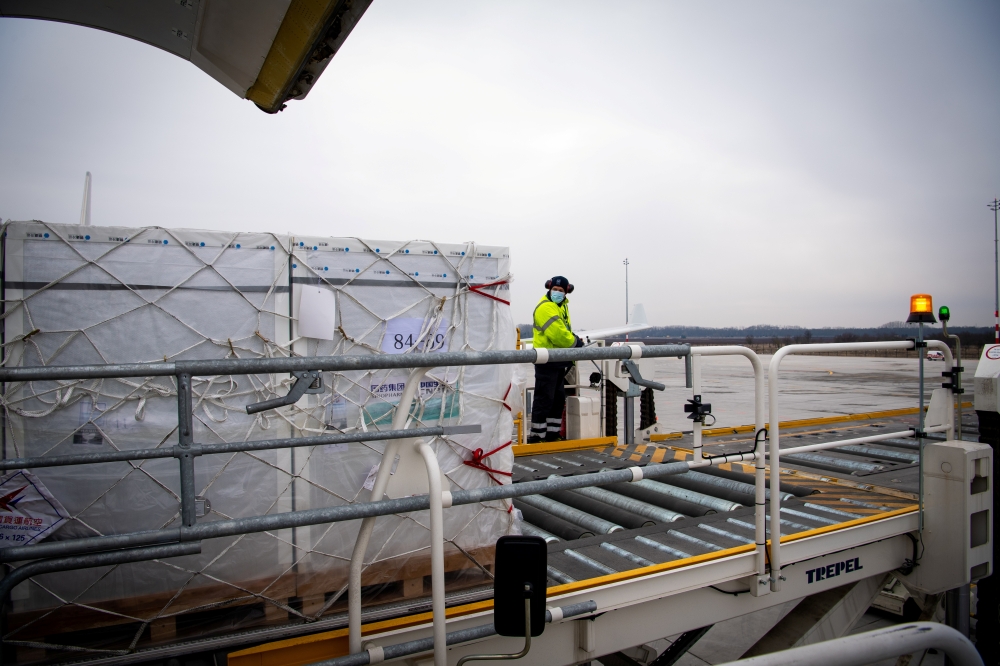 A shipment of Chinese Sinopharm's coronavirus disease (COVID-19) vaccine arrives at Budapest Airport, Hungary, February 16, 2021. Ministry of Foreign Affairs and Trade (KKM)/Handout via REUTERS