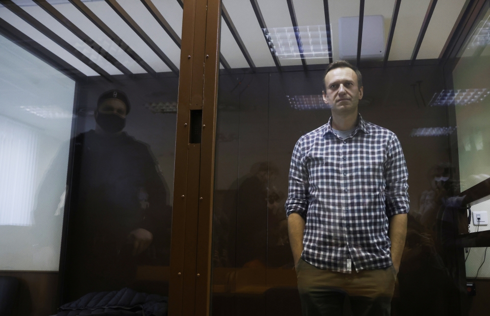 Russian opposition leader Alexei Navalny attends a hearing to consider an appeal against an earlier court decision to change his suspended sentence to a real prison term, in Moscow, Russia February 20, 2021. REUTERS/Maxim Shemetov 