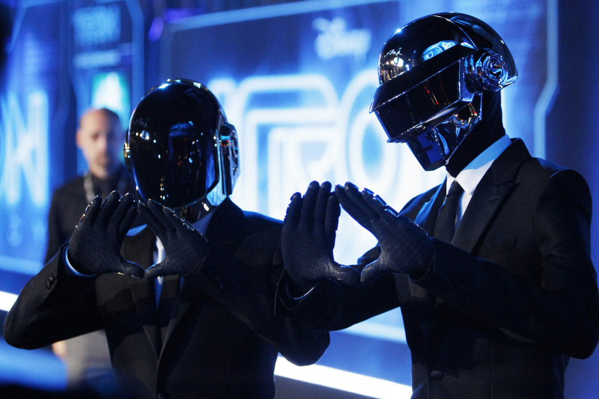 Musicians Thomas Banglater and Guy-Manuel de Homem-Christo of Daft Punk pose at the world premiere of the film 