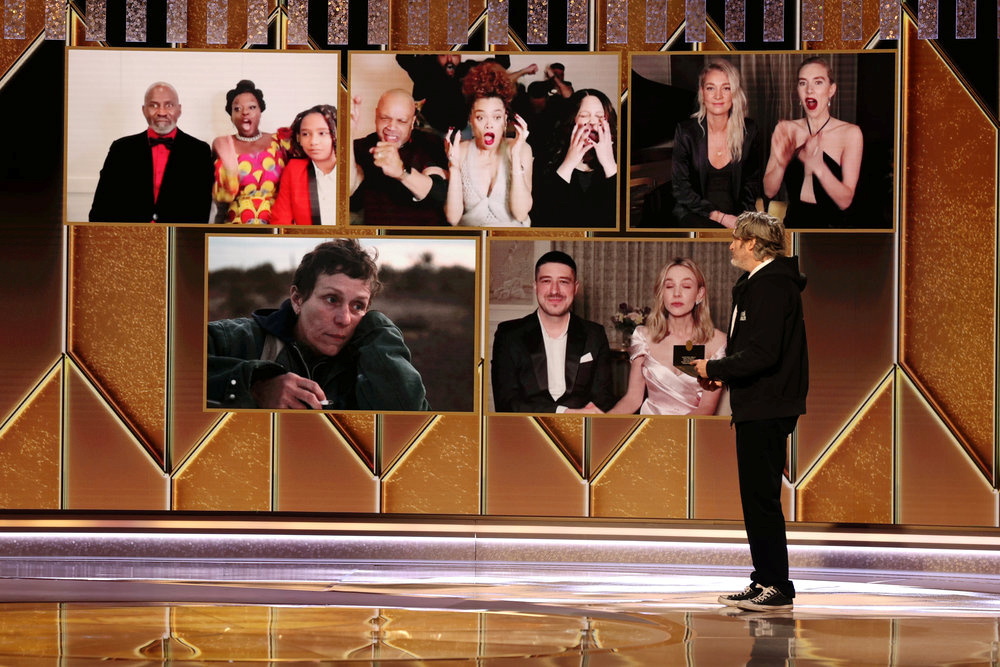 Andra Day (top center) reacts after being announced winner of the Best Actress - Motion Picture Drama award for 