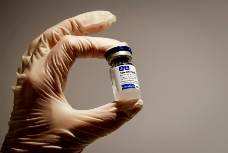 A medical specialist holds a vial of Sputnik V vaccine against the coronavirus in a department store in Moscow, Russia, January 18, 2021. REUTERS/Shamil Zhumatov/File Photo
