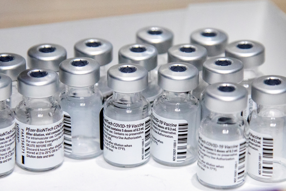 File photo: Empty vials of the Pfizer-BioNTech coronavirus disease (COVID-19) vaccine are seen at The Michener Institute, in Toronto, Canada January 4, 2021. REUTERS/Carlos Osorio/File Photo