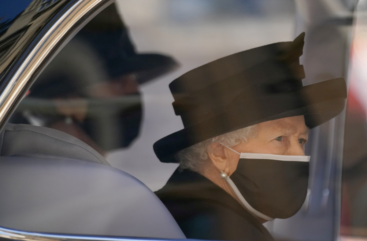FILE PHOTO: Britain's Queen Elizabeth II arrives for the funeral of Britain's Prince Philip, who died at the age of 99, at St George's Chapel, in Windsor, Britain, April 17, 2021. Victoria Jones/Pool via REUTERS/File Photo
