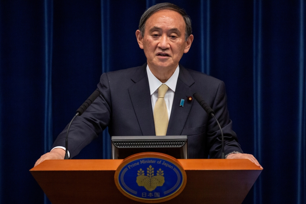 Japanese Prime Minister Yoshihide Suga speaks during a press conference on Covid-19 situation in Tokyo, Japan April 23, 2021. Yuichi Yamazaki/Pool via Reuters