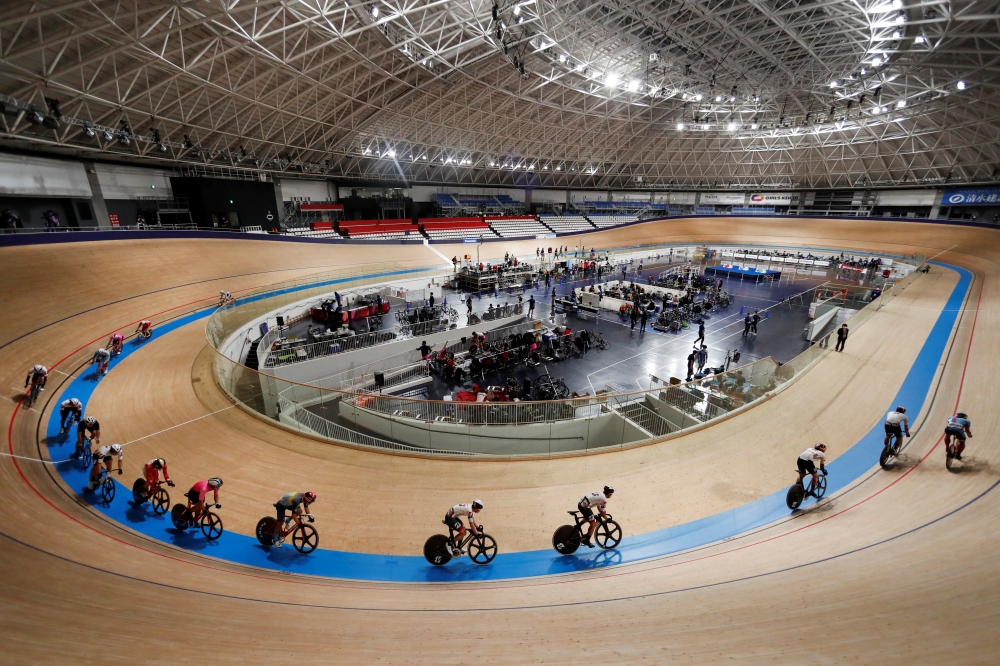 Riders compete in the men's Omnium Scratch Race 1/4 during the Tokyo 2020 Olympics test event for track cycling at the Izu Velodrome in Izu, Shizuoka prefecture, Japan April 25, 2021. REUTERS/Issei Kato
