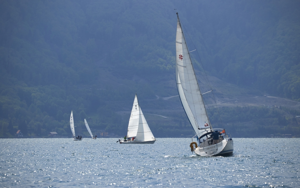 Boats prepare to line up on Leman Lake to reveal the invisible French-Swiss border during an artistic event called 