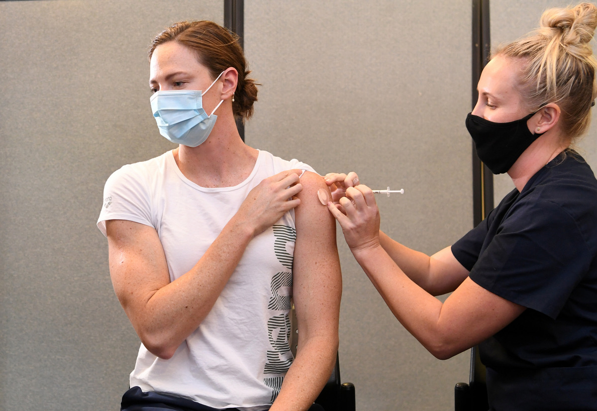 Australian Olympic swimmer Cate Campbell receives the Pfizer coronavirus disease (COVID-19) vaccine at the Queensland Academy of Sport in Brisbane, Australia, May 10, 2021. AAP Image/Dan Peled via REUTERS 
