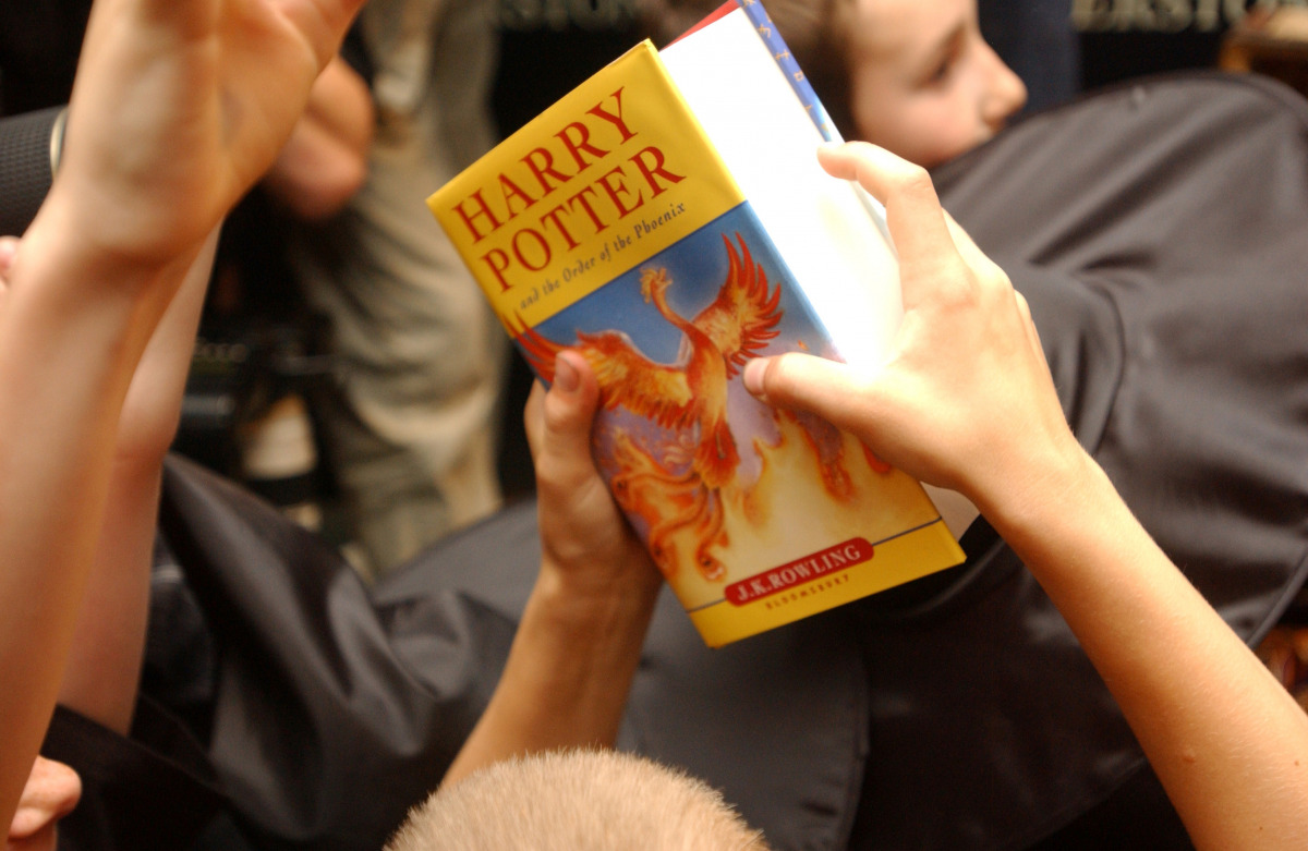FILE PHOTO: A child holds a copy of 