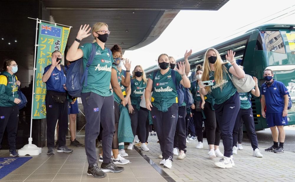 Members of Australia's Olympic softball team wave upon their arrival at a hotel in Ota, Gunma Prefecture, Japan, where they have a training camp in this photo taken by Kyodo June 1, 2021. Mandatory credit Kyodo/via REUTERS