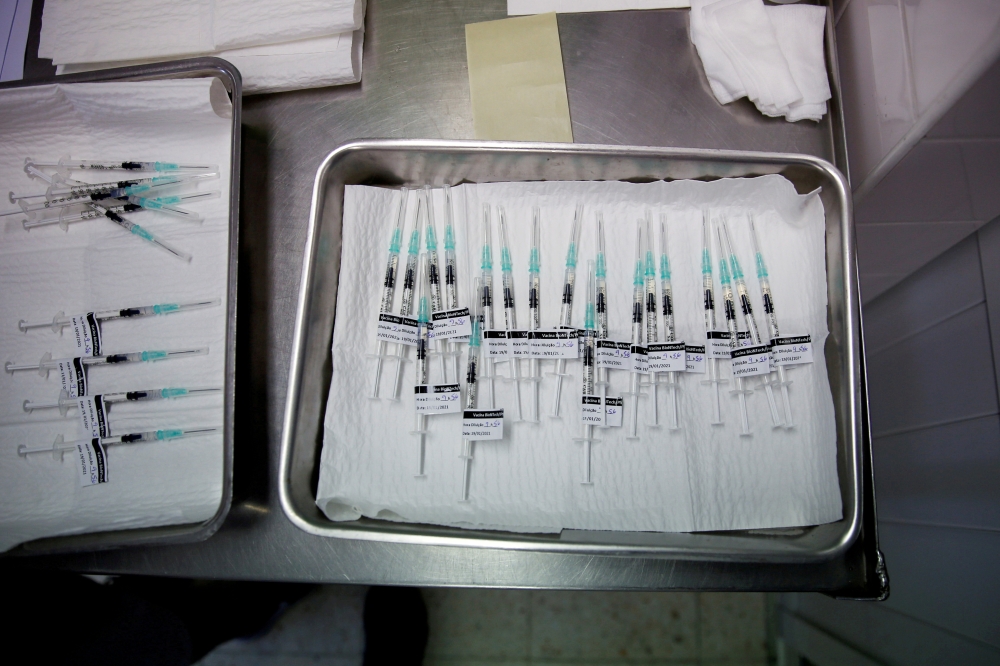 Pfizer-BioNTech coronavirus disease (COVID-19) vaccines are seen at Sao Jose Hospital in Lisbon, Portugal, January 19, 2021. REUTERS/Pedro Nunes/File Photo
