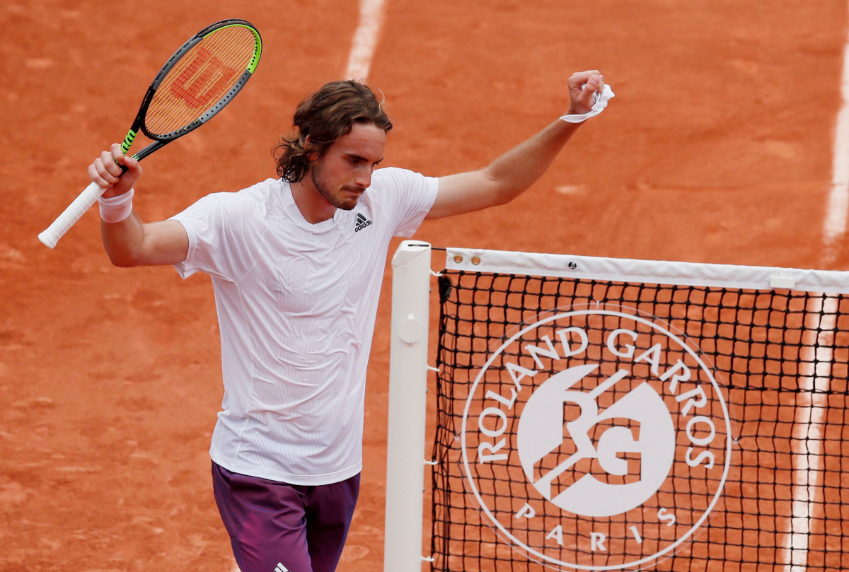 Tennis - French Open - Roland Garros, Paris, France - June 2, 2021 Greece's Stefanos Tsitsipas celebrates winning his second round match against Spain's Pedro Martínez REUTERS/Gonzalo Fuentes
