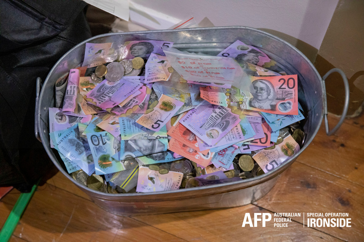 Money seized by Australian Federal Police are seen after its Operation ironside against organised crime in this undated handout photo released June 8, 2021. Australian Federal Police/Handout via REUTERS