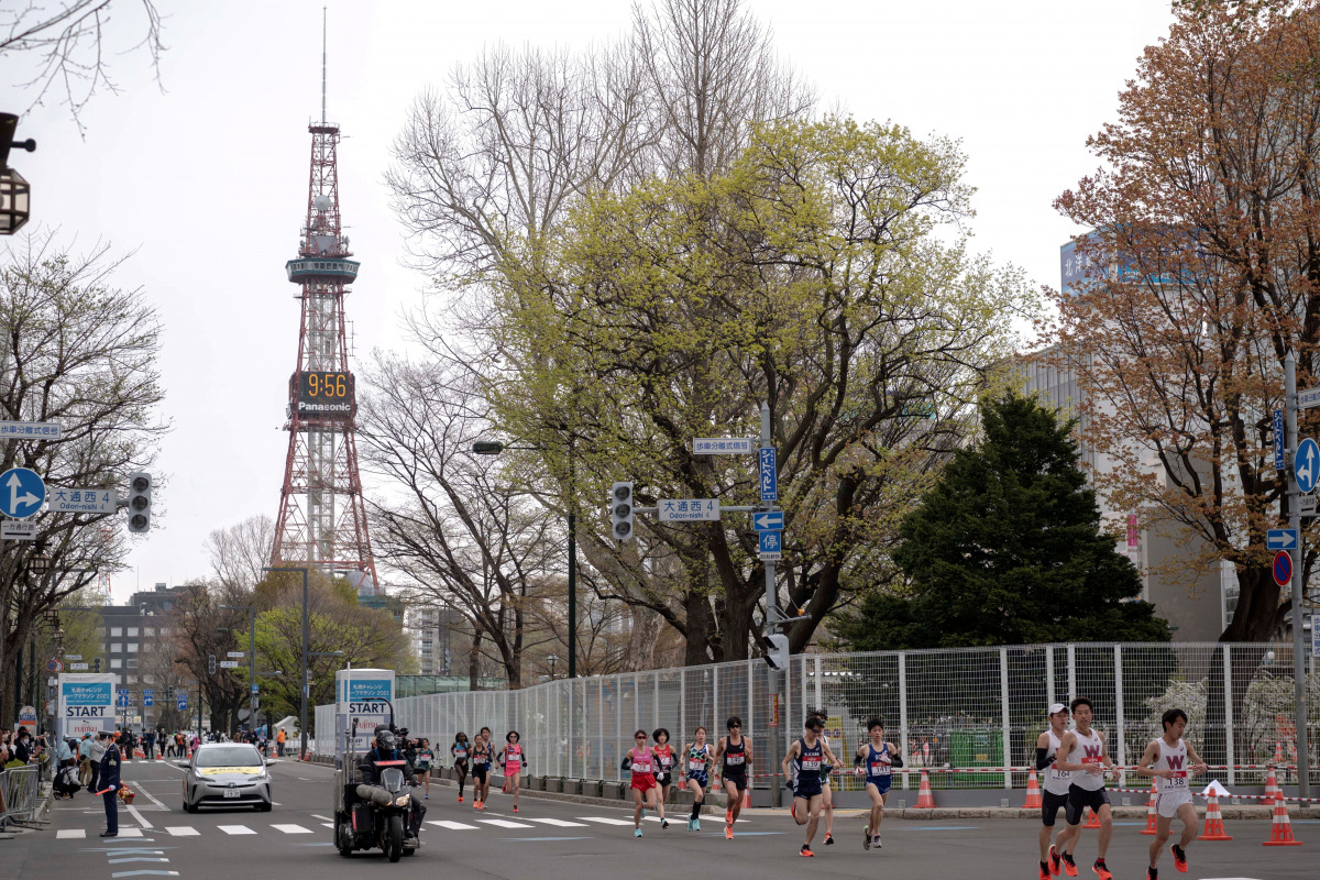 FILE PHOTO: Athletes compete at the half-marathon race which doubles as a test event for the 2020 Tokyo Olympics, in Sapporo, Japan May 5, 2021. Charly Triballeau/Pool via REUTERS/File Photo
