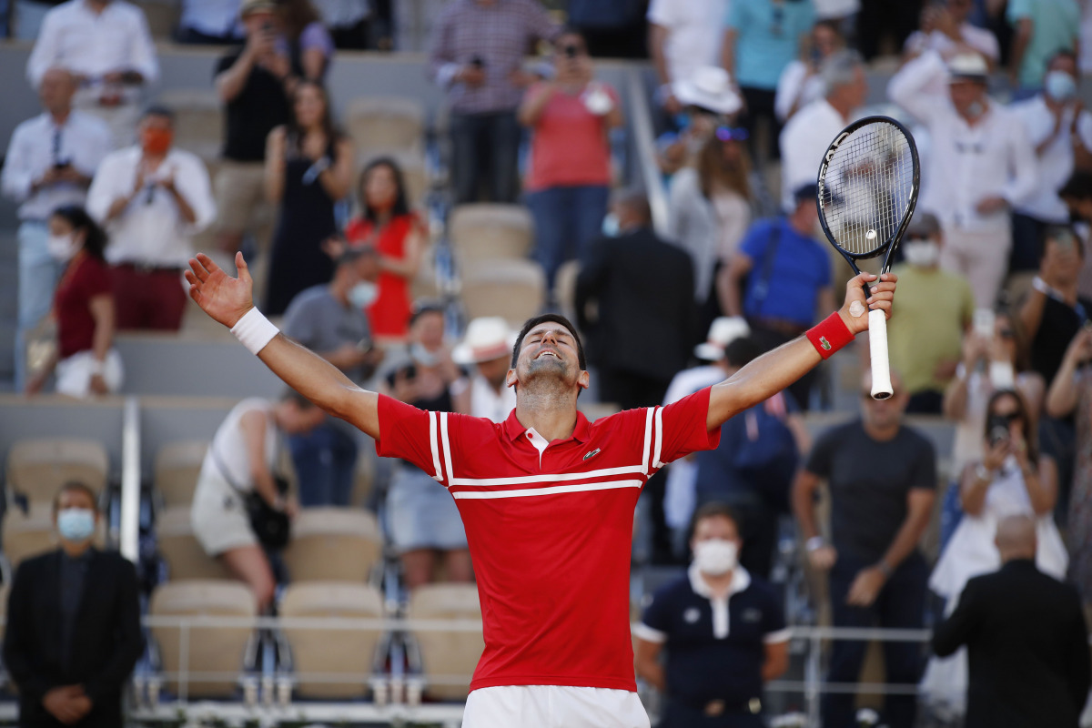 Tennis - French Open - Roland Garros, Paris, France - June 13, 2021 Serbia's Novak Djokovic celebrates winning the final against Greece's Stefanos Tsitsipas REUTERS/Gonzalo Fuentes
