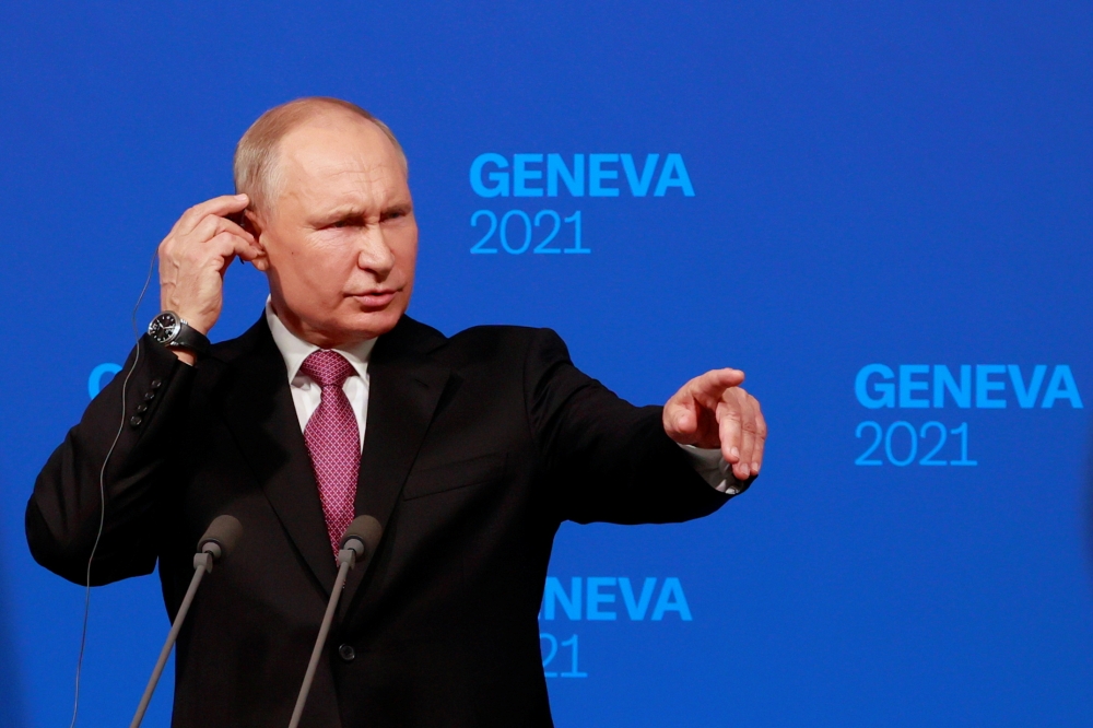Russia's President Vladimir Putin gestures as he holds a news conference after the U.S.-Russia summit with U.S. President Joe Biden at Villa La Grange in Geneva, Switzerland, June 16, 2021. REUTERS/Denis Balibouse/Pool