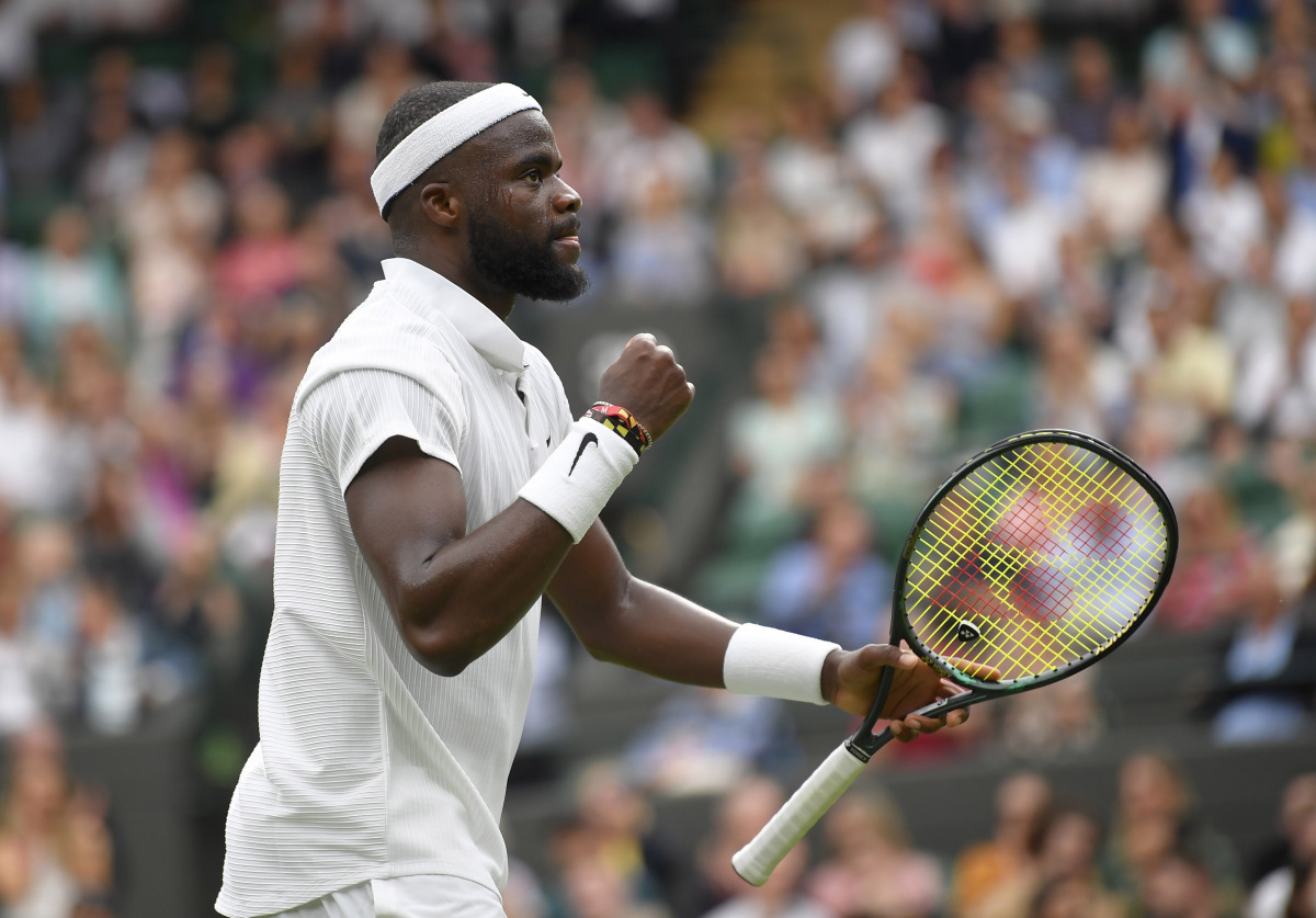 Tennis - Wimbledon - All England Lawn Tennis and Croquet Club, London, Britain - June 28, 2021 Frances Tiafoe of the U.S. celebrates during his first round match against Greece's Stefanos Tsitsipas REUTERS/Toby Melville
