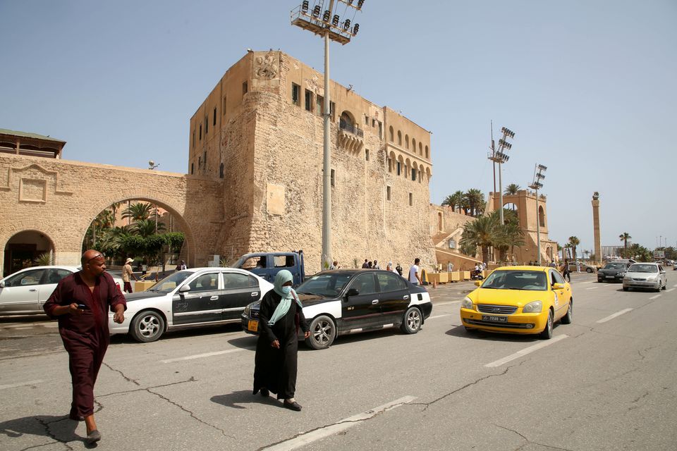 People cross a street at Martyrs Square in Tripoli, Libya, July 5, 2021. REUTERS/Hazem Ahmed/File Photo

