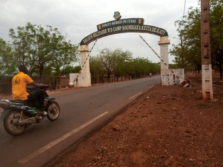 A man rides a motorcycle as he drives past the entrance of the Malian army force base. (Reuters/File Photo)Reuters

