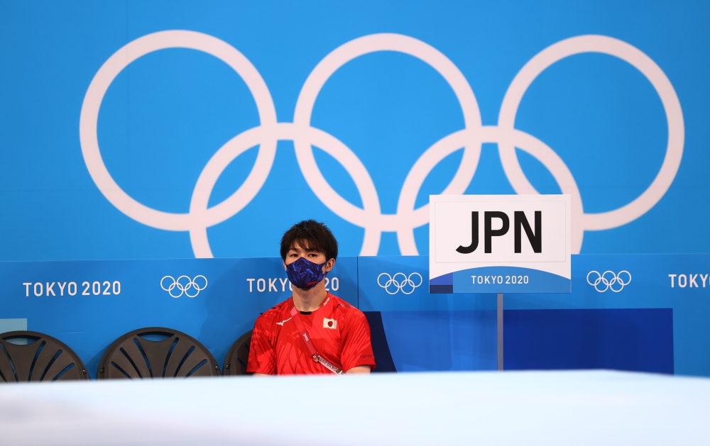 Kohei Uchimura of Japan wearing a protective face mask during training REUTERS/Mike Blake