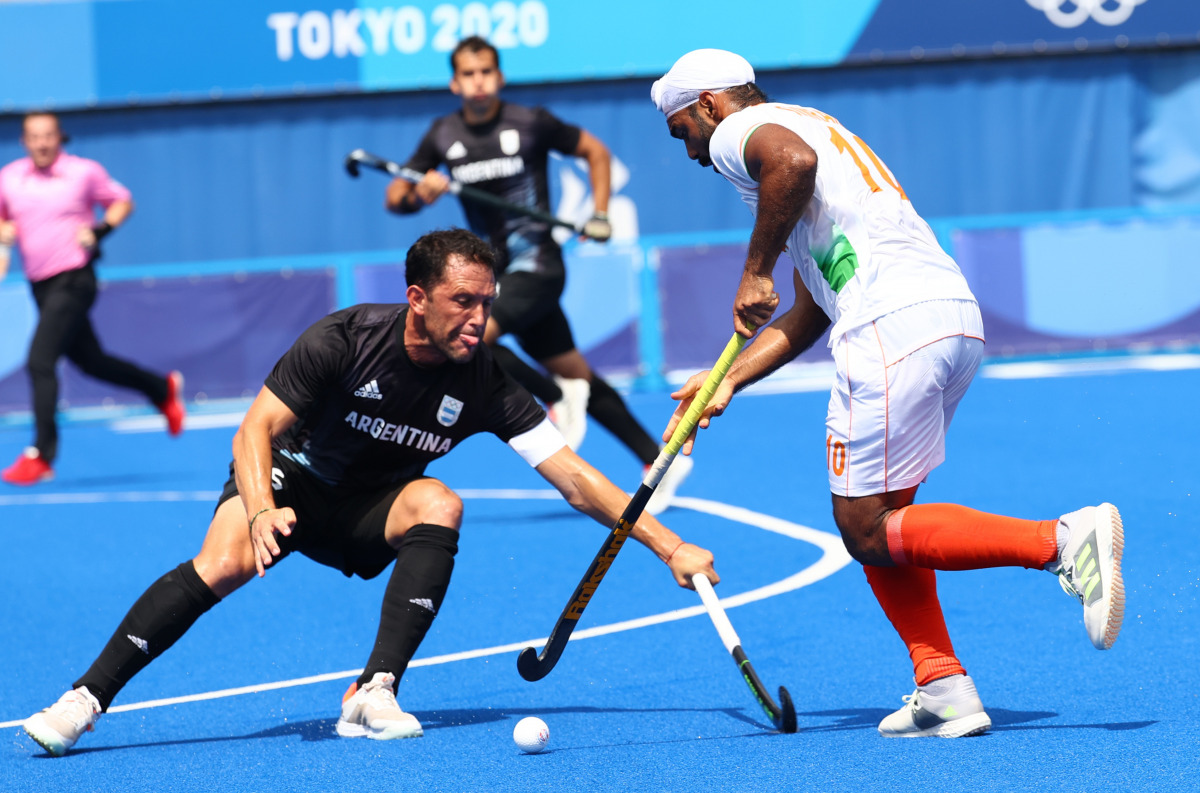 Tokyo 2020 Olympics - Hockey - Men's Pool A - India v Argentina - Oi Hockey Stadium, Tokyo, Japan - July 29, 2021. Pedro Ibarra of Argentina in action against Simranjeet Singh of India. REUTERS/Bernadett Szabo
