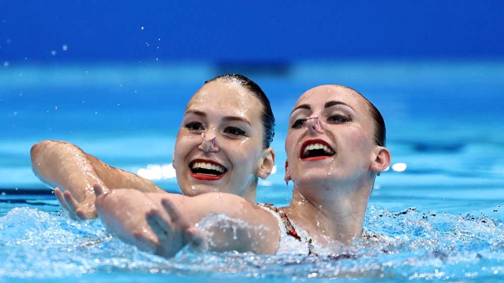 Marta Fiedina of Ukraine and Anastasiya Savchuk of Ukraine during their performance. Reuters/Marko Djurica