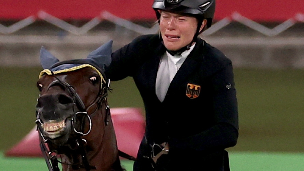 Annika Schleu of Germany reacts before being eliminated REUTERS/Ivan Alvarado