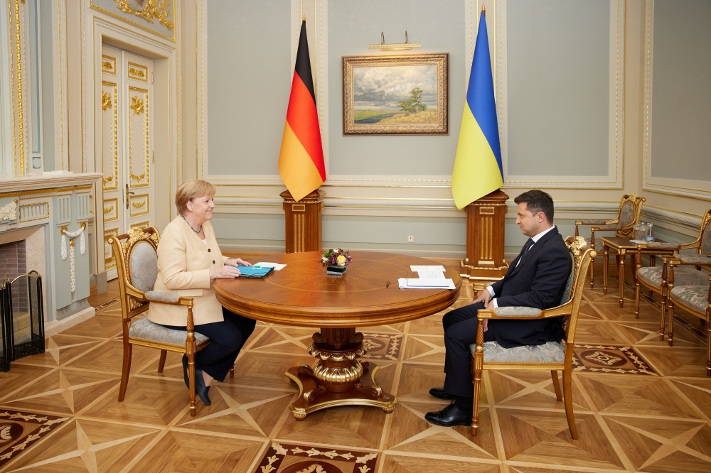 Ukrainian President Volodymyr Zelenskiy attends a meeting with German Chancellor Angela Merkel in Kyiv, Ukraine August 22, 2021. 