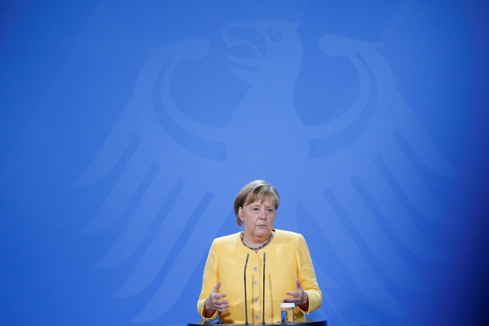 German Chancellor Angela Merkel attends a press conference at the G20 Compact with Africa (CwA) meeting in Berlin, Germany, August 27, 2021. REUTERS/Michele Tantussi