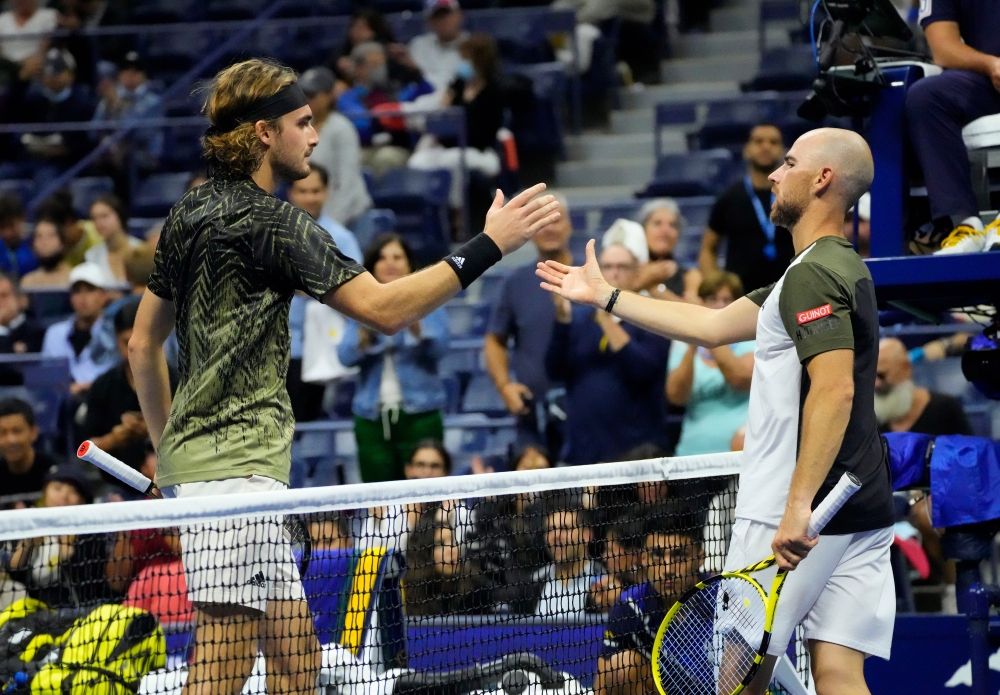 Stefanos Tsitsipas of Greece (left) after defeating Adrian Mannarino of France on day three of the 2021 US Open tennis tournament at USTA Billie King National Tennis Center. Robert Deutsch-USA TODAY Sports

