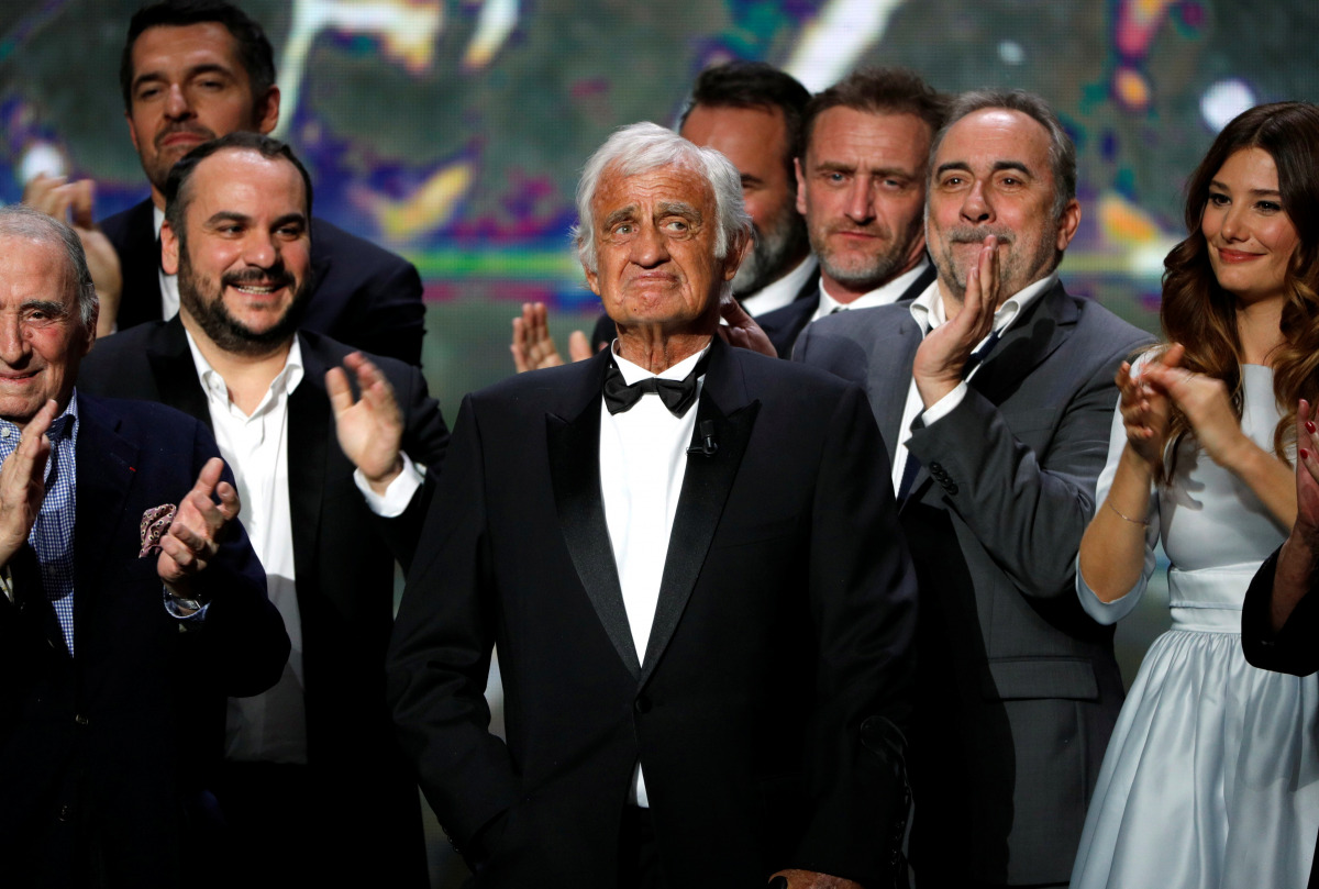 FILE PHOTO: Actor Jean-Paul Belmondo reacts on stage as he receives an Honorary Cesar Award at the 42nd Cesar Awards ceremony in Paris, France, February 24, 2017. REUTERS/Philippe Wojazer/File Photo
