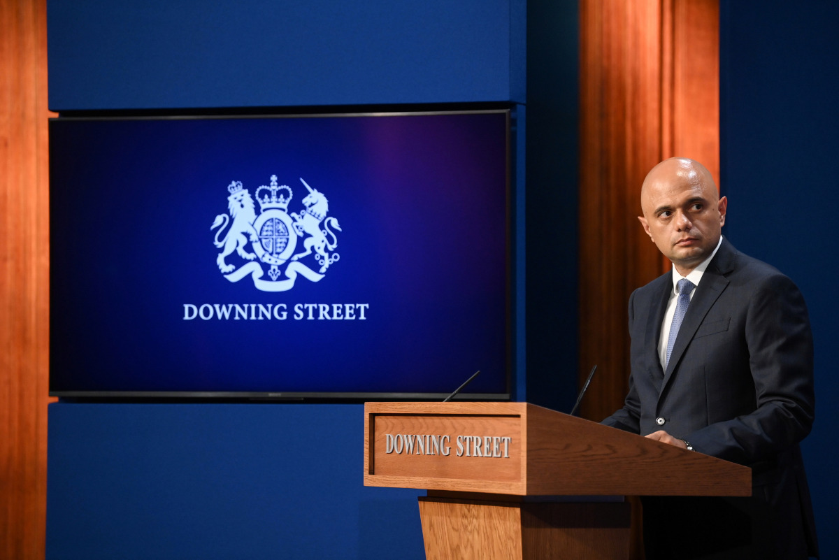 FILE PHOTO: Britain's Health Secretary Sajid Javid looks on during a news conference with Britain's Prime Minister Boris Johnson and Britain's Chancellor of the Exchequer Rishi Sunak, in Downing Street, in London, Britain, September 7, 2021. REUTERS/Toby 