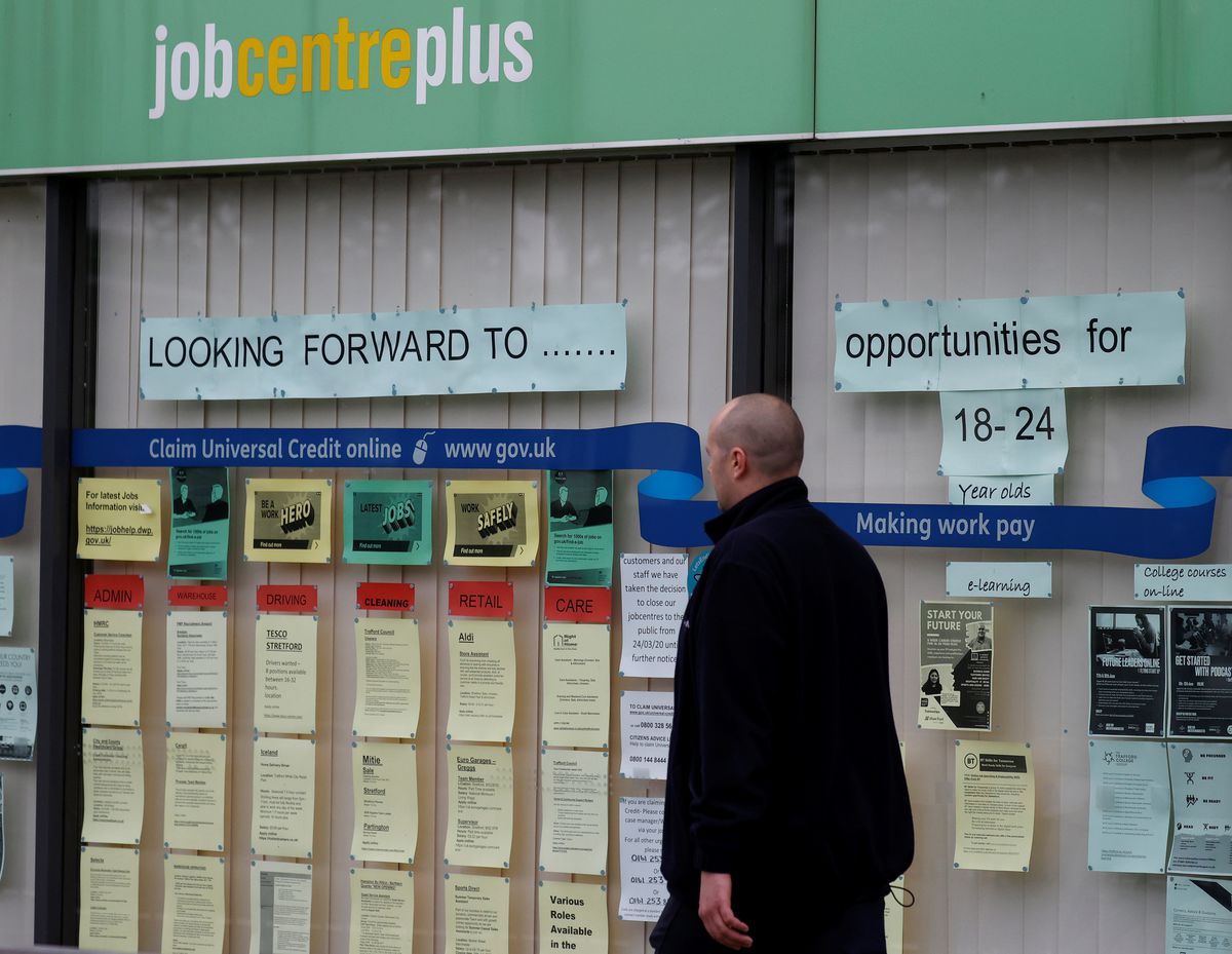A man walks past a job centre following the outbreak of the coronavirus disease (COVID-19), in Manchester, Britain, July 8, 2020. Reuters/Phil Noble
