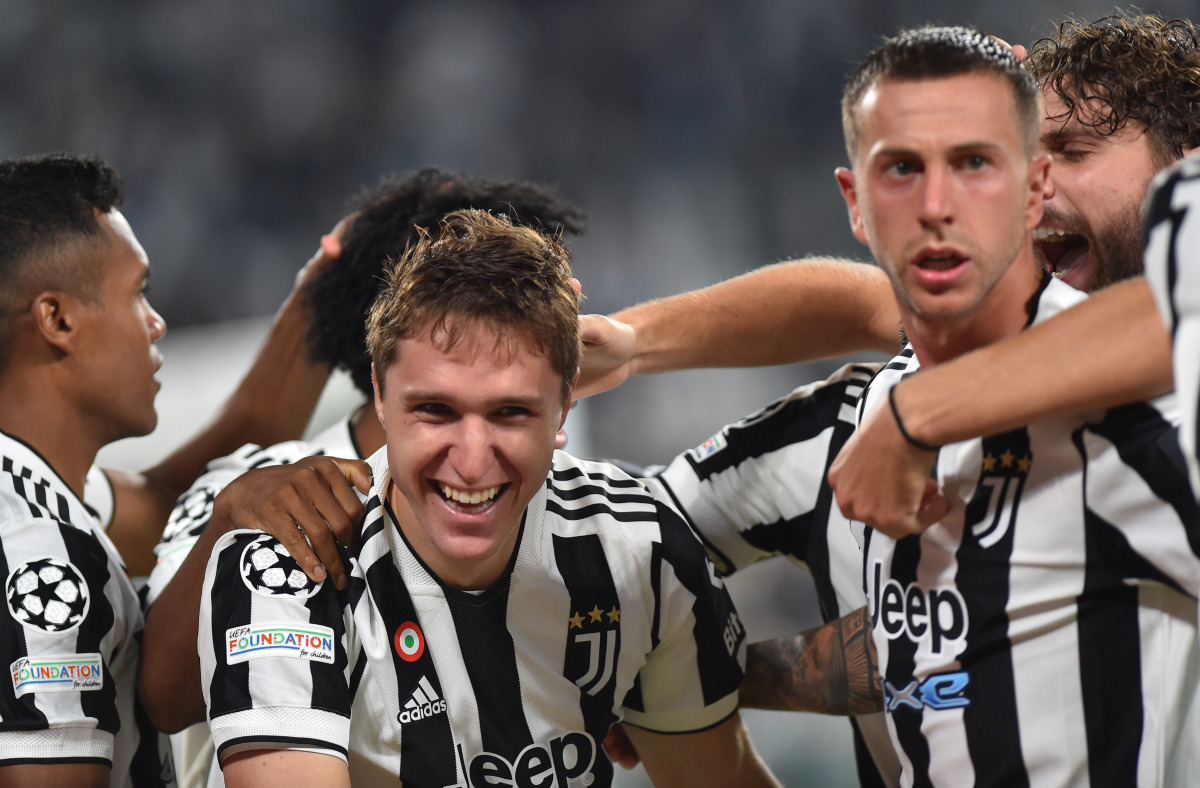 Juventus' Federico Chiesa celebrates scoring their first goal with teammates REUTERS/Massimo Pinca
