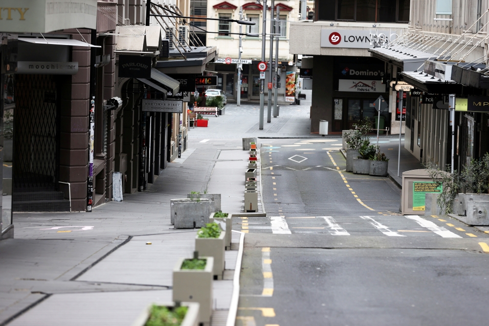 The normally bustling High Street in Auckland’s CBD is largely deserted during a lockdown to curb the spread of a coronavirus disease (COVID-19) outbreak, in Auckland, New Zealand, August 26, 2021. REUTERS/Fiona Goodall/File Photo