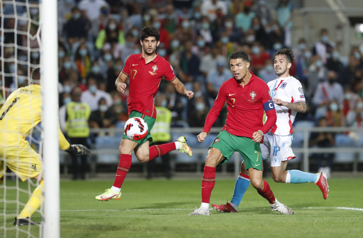 Portugal's Cristiano Ronaldo scores their fifth goal to complete his hat-trick REUTERS/Pedro Nunes