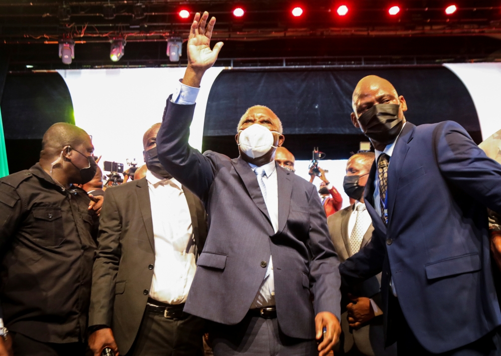 Ivory Coast's former President Laurent Gbagbo waves during a meeting to launch the formation of a new political party, in Abidjan on October 16, 2021. (Reuters/Luc Gnago)