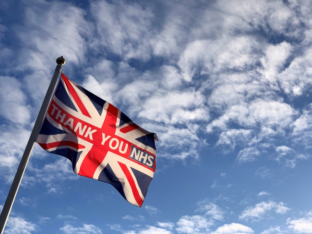 A British national flag with the words 'THANK YOU NHS' (National Health Service) in London on July 6 2020. (REUTERS/Russell Boyce)