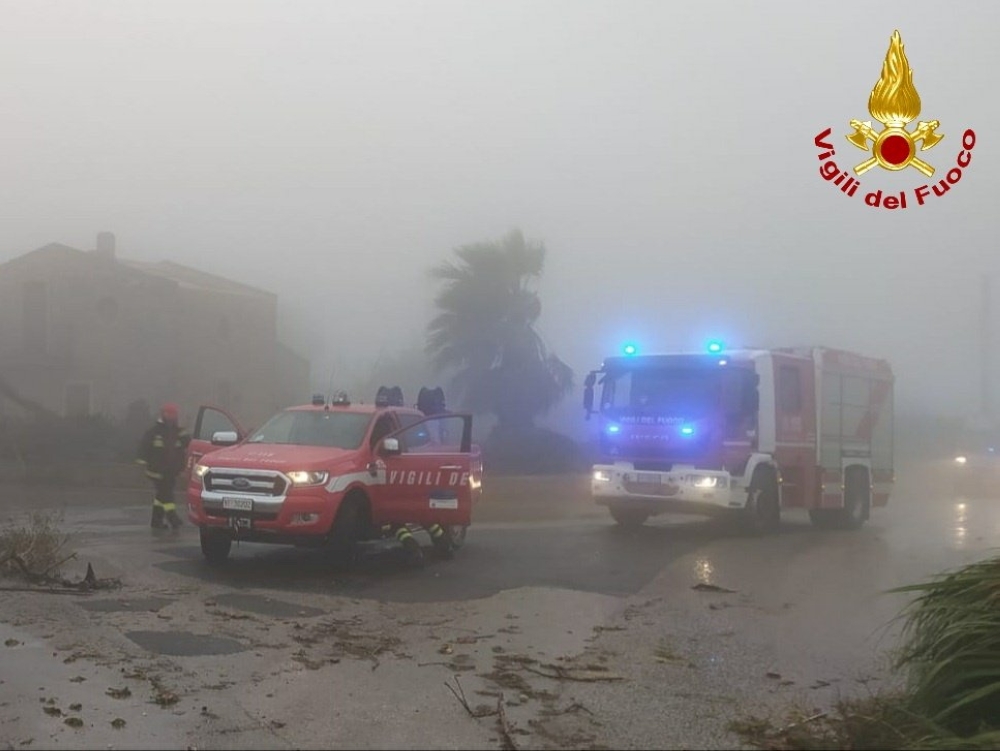 Fire brigade vehicles are seen in an area affected by a whirlwind in the Sicilian town of Modica, Sicily, Italy November 17, 2021. VIGILI DEL FUOCO/Handout via REUTERS