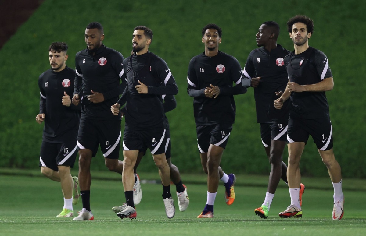 Qatar players in action during a training session yesterday.