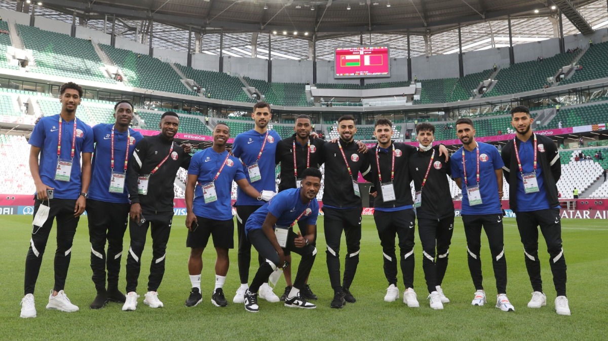 Qatar players pose for a photo.