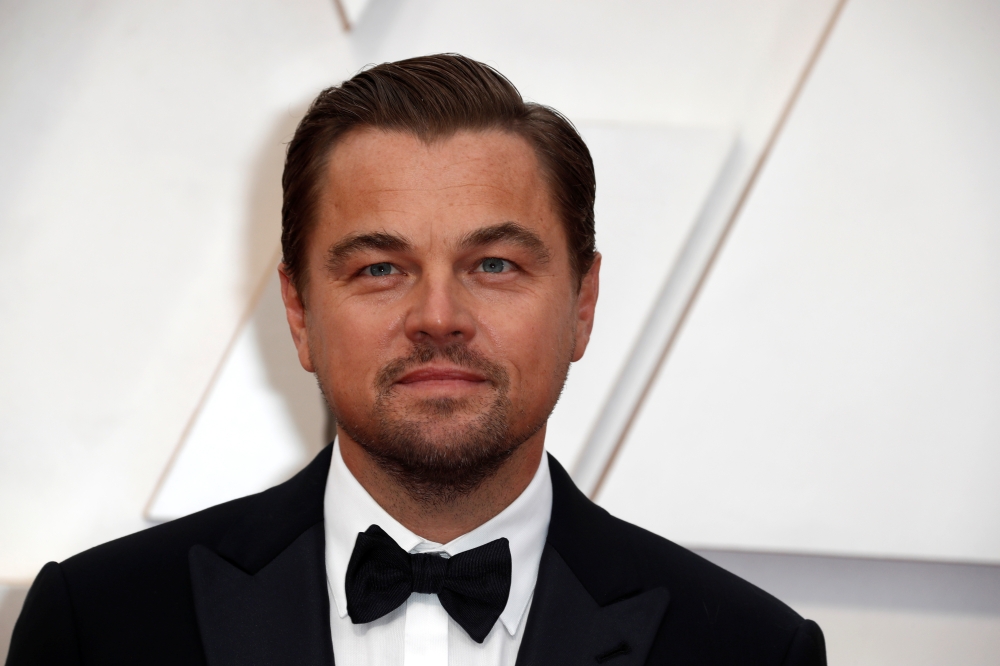 Leonardo DiCaprio poses on the red carpet during the Oscars arrivals at the 92nd Academy Awards in Hollywood, Los Angeles, California, U.S., February 9, 2020. Reuters/Eric Gaillard/File Photo