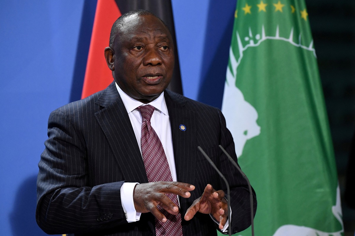 FILE PHOTO: South African President Cyril Ramaphosa addresses a press conference after the G20 Compact with Africa conference at the Chancellery in Berlin, Germany August 27, 2021. Tobias Schwarz/Pool via REUTERS//File Photo
