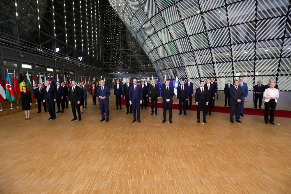 European Council President Charles Michel and European Commission President Ursula von der Leyen pose for a family photo with leaders of EU countries and the governments of the 