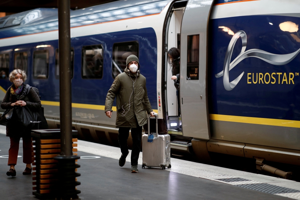 Passengers arrive at the Eurostar terminal at Gare du Nord train station, amidst the coronavirus disease (COVID-19) pandemic, in Paris, France December 23, 2020. REUTERS/Benoit Tessier/File Photo